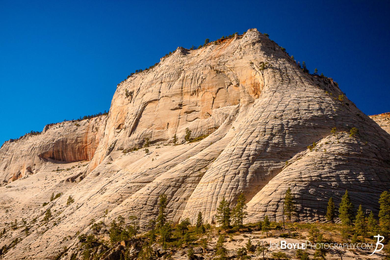 canyon-cliff-face-with-long-shadows-in-zion-national-park